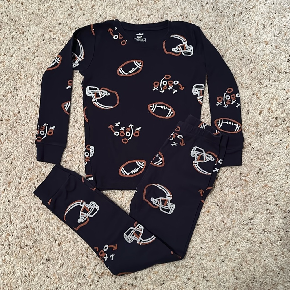 Boys Carters football print snug fit pajamas. Size 7